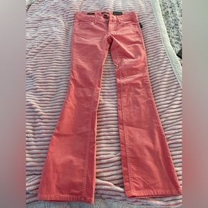 Coral Low rise flare jeans.